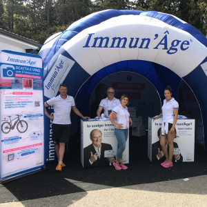 Photo of Immun' Âge booth from Giro d'Italia!